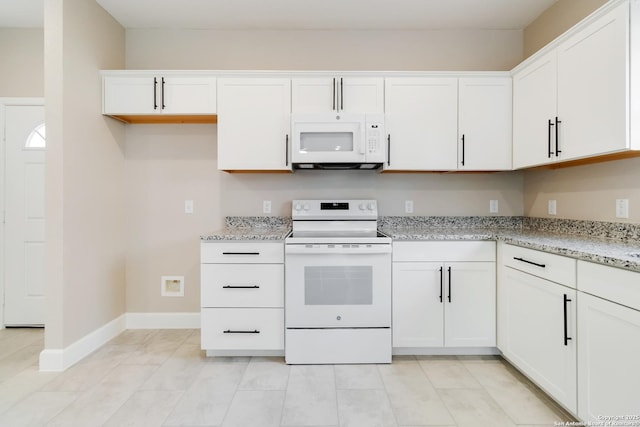 127 Hopi, San Antonio, TX 78211 - kitchen with white appliances, white cabinetry, baseboards, and light stone countertops