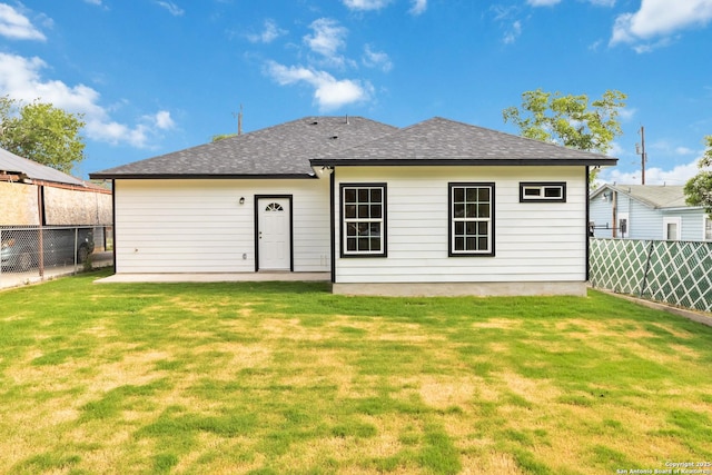 127 Hopi, San Antonio, TX 78211 - back of house with a patio and a shingled roof