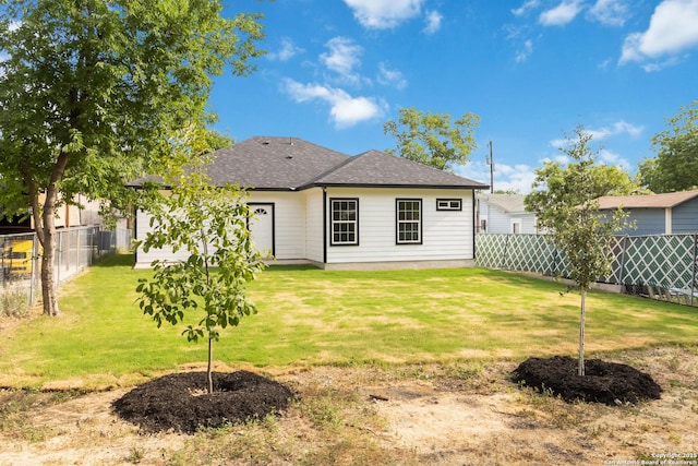 127 Hopi, San Antonio, TX 78211 - back of house with a shingled roof