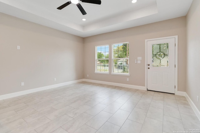 127 Hopi, San Antonio, TX 78211 - entryway with a raised ceiling, a ceiling fan, recessed lighting, and baseboards