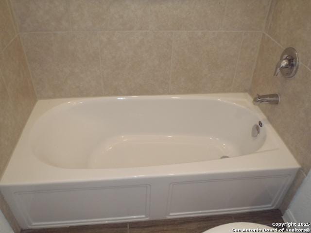 5919 Corsicana, Seguin, TX 78155 - bathroom featuring a tub to relax in and toilet