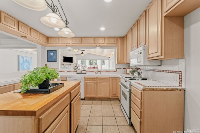 219 Ridgehaven, San Antonio, TX 78209 - kitchen with butcher block counters, white appliances, backsplash, light brown cabinetry, and a sink