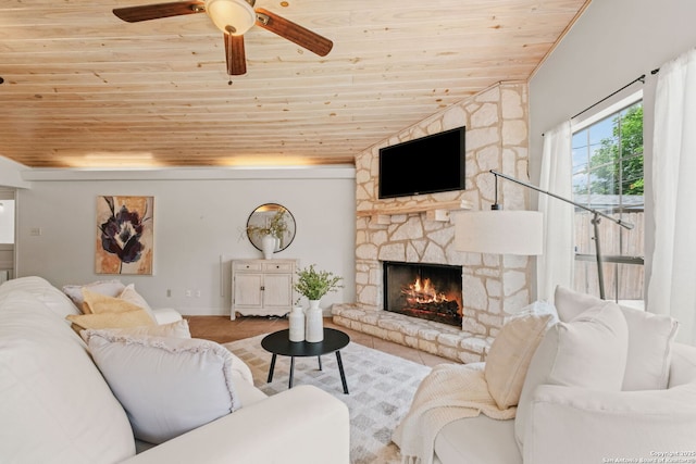 219 Ridgehaven, San Antonio, TX 78209 - living area featuring wooden ceiling, a stone fireplace, ceiling fan, and baseboards