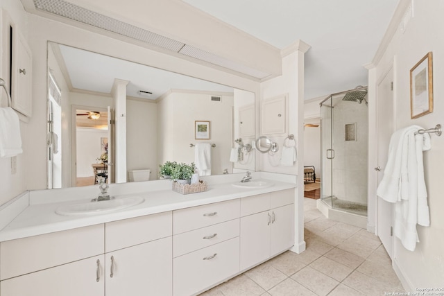 219 Ridgehaven, San Antonio, TX 78209 - full bathroom featuring tile patterned flooring, a shower stall, double vanity, and ceiling fan