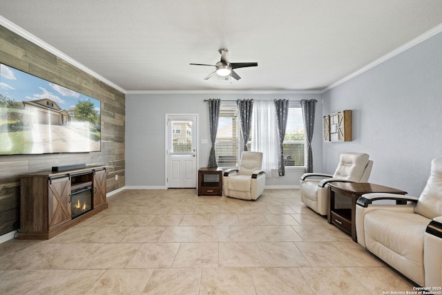 13818 Cohan Way, San Antonio, TX 78253 - living area with plenty of natural light, a ceiling fan, crown molding, baseboards, and wooden walls