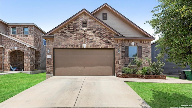 4527 Southton Way, San Antonio, TX 78223 - view of front of property featuring brick siding, a front yard, and concrete driveway