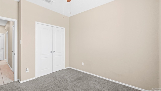 4527 Southton Way, San Antonio, TX 78223 - unfurnished bedroom featuring carpet, a closet, baseboards, and a ceiling fan