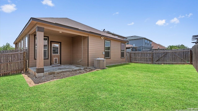 4527 Southton Way, San Antonio, TX 78223 - rear view of property with a patio area and central AC