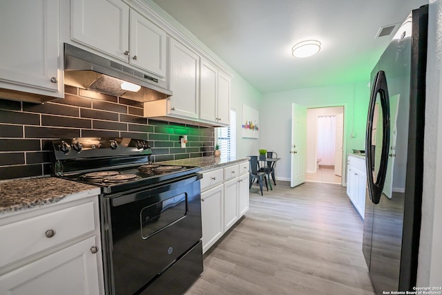 555 Hansford, San Antonio, TX 78210 - kitchen featuring black appliances, under cabinet range hood, decorative backsplash, and white cabinetry