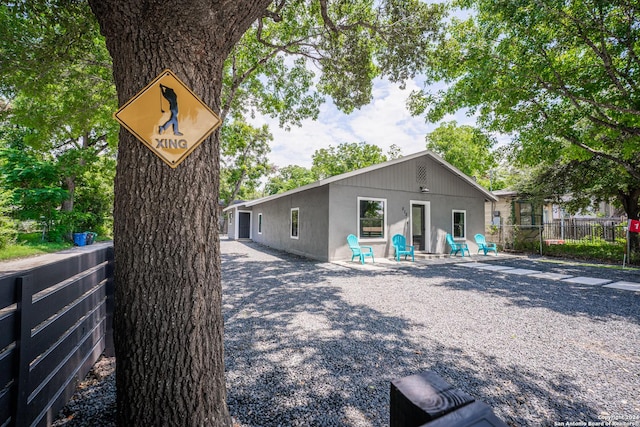 555 Hansford, San Antonio, TX 78210 - rear view of property featuring a patio area and stucco siding