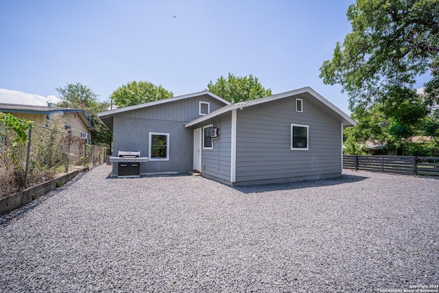555 Hansford, San Antonio, TX 78210 - rear view of property featuring a fenced backyard and a patio