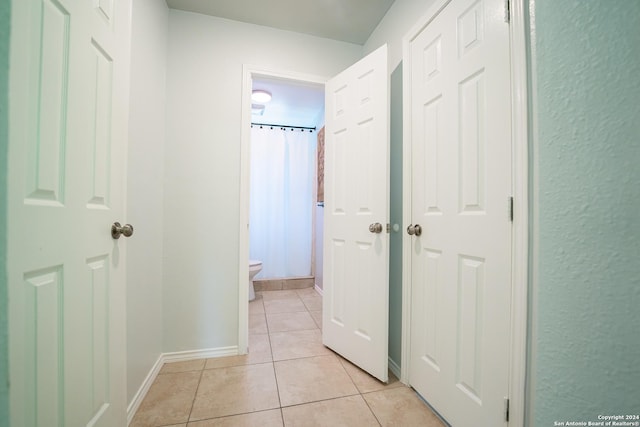 555 Hansford, San Antonio, TX 78210 - hall with light tile patterned floors and baseboards