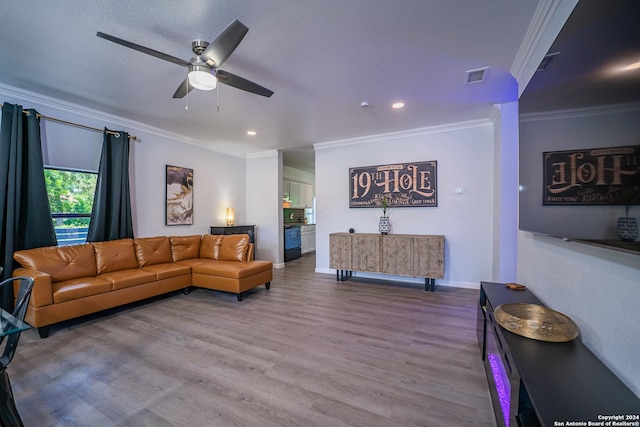 555 Hansford, San Antonio, TX 78210 - living room with wood finished floors, a ceiling fan, crown molding, baseboards, and recessed lighting