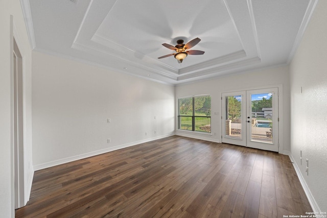 154 Lake View Dr, Boerne, TX 78006 - spare room featuring a raised ceiling, ceiling fan, dark wood-style flooring, crown molding, and french doors