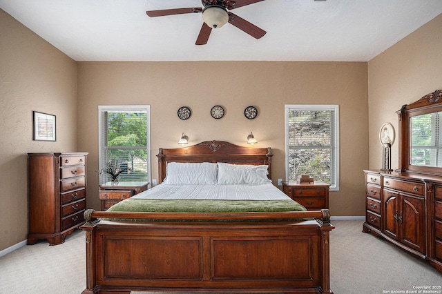 177 Ten W Dr, Comfort, TX 78013 - bedroom featuring light colored carpet, baseboards, and ceiling fan