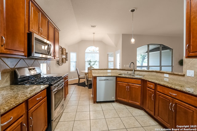 21931 Ruby Run, San Antonio, TX 78259 - kitchen featuring appliances with stainless steel finishes, a sink, backsplash, lofted ceiling, and light tile patterned flooring