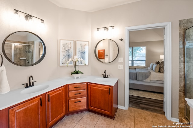 21931 Ruby Run, San Antonio, TX 78259 - ensuite bathroom with double vanity, tile patterned floors, and a tile shower