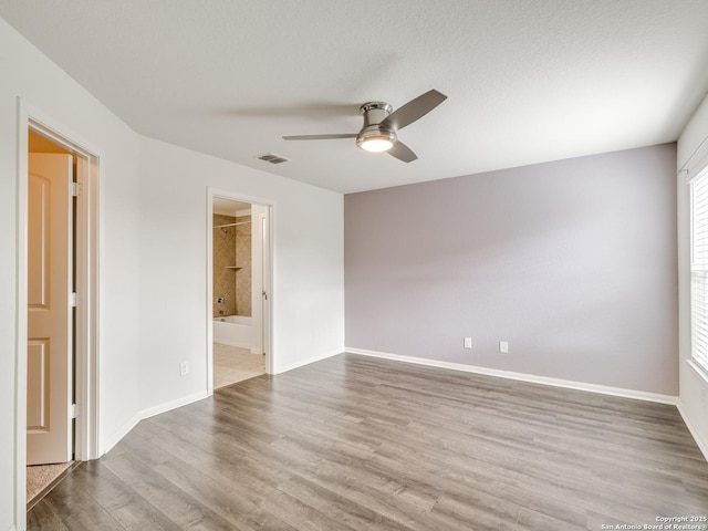 7071 Capeshaw, San Antonio, TX 78252 - empty room featuring ceiling fan, wood finished floors, and baseboards