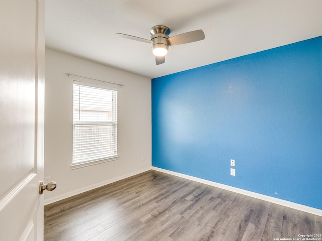 7071 Capeshaw, San Antonio, TX 78252 - spare room with a ceiling fan, wood finished floors, and baseboards