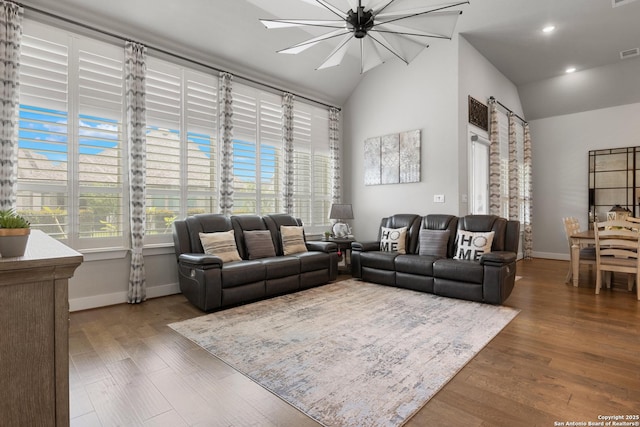 17918 Cantera Ct, San Antonio, TX 78255 - living room featuring vaulted ceiling, wood finished floors, baseboards, and recessed lighting