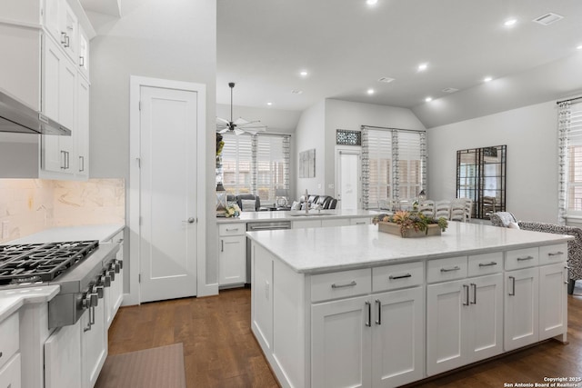 17918 Cantera Ct, San Antonio, TX 78255 - kitchen featuring stainless steel appliances, a kitchen island, white cabinets, decorative backsplash, and recessed lighting