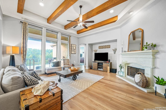 17055 Sonoma, San Antonio, TX 78255 - living room with a ceiling fan, light wood-type flooring, beam ceiling, a premium fireplace, and recessed lighting