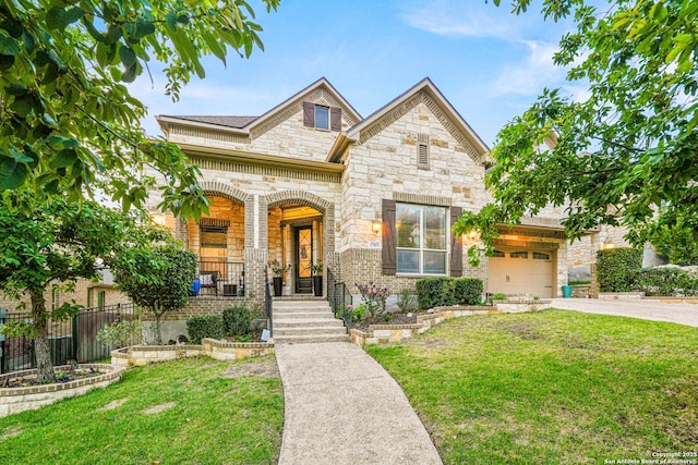17055 Sonoma, San Antonio, TX 78255 - french country home featuring driveway, covered porch, stone siding, and brick siding