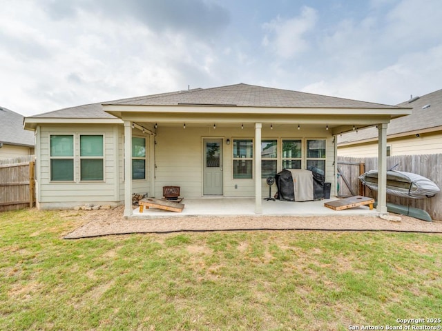 1136 Amber Lk, Seguin, TX 78155 - rear view of property with a patio, a hot tub, and roof with shingles