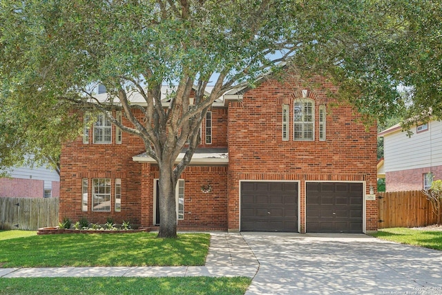 2834 Olive Ave, Schertz, TX 78154 - view of front of house featuring driveway, an attached garage, and brick siding