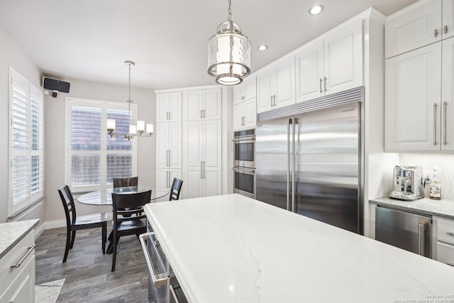2834 Olive Ave, Schertz, TX 78154 - kitchen featuring a chandelier, stainless steel appliances, wine cooler, dark wood-type flooring, and recessed lighting