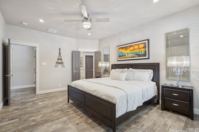 2834 Olive Ave, Schertz, TX 78154 - bedroom featuring baseboards, wood finished floors, recessed lighting, and ceiling fan
