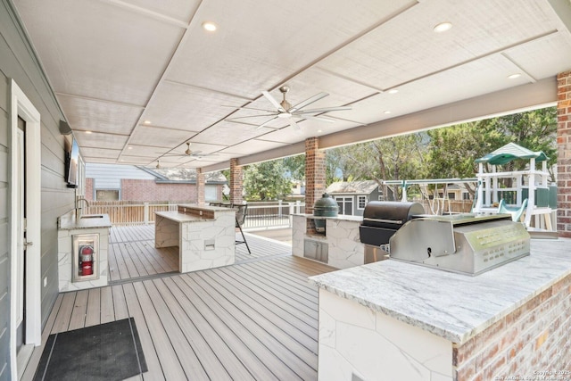 2834 Olive Ave, Schertz, TX 78154 - wooden deck with a ceiling fan and an outdoor bar