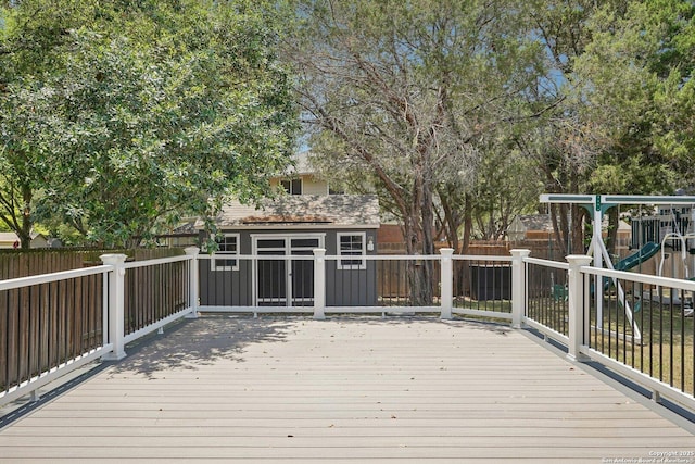 2834 Olive Ave, Schertz, TX 78154 - wooden deck with a fenced backyard and a playground