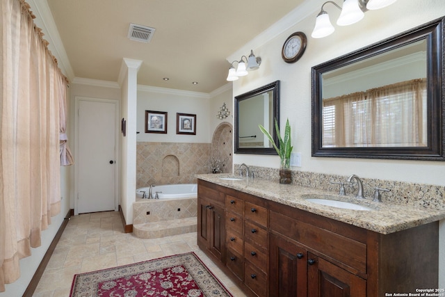 14211 Edge Pt, San Antonio, TX 78230 - full bath featuring a garden tub, double vanity, crown molding, and stone tile floors