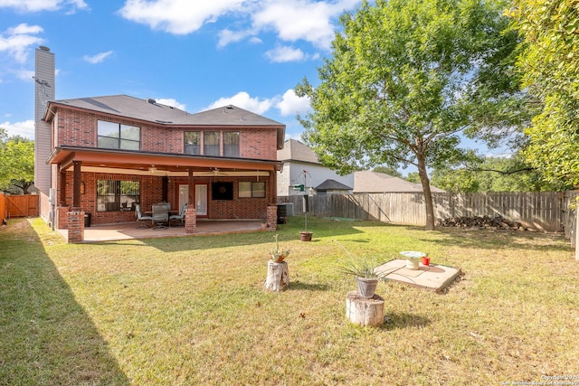 14211 Edge Pt, San Antonio, TX 78230 - back of house with brick siding, a chimney, a patio area, cooling unit, and ceiling fan