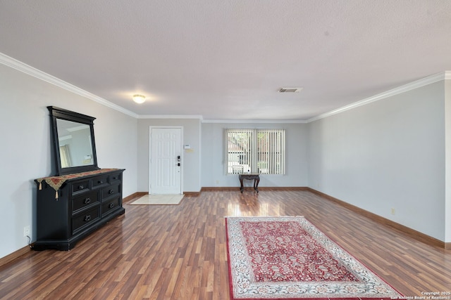 14211 Edge Pt, San Antonio, TX 78230 - foyer entrance featuring wood finished floors, crown molding, and baseboards