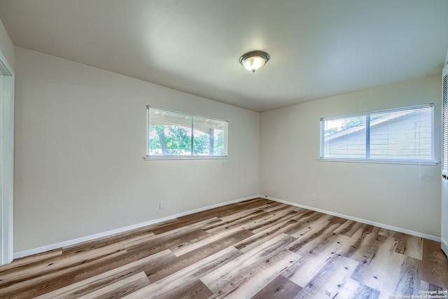 3206 Bluefield, San Antonio, TX 78230 - empty room with light wood-style flooring and baseboards