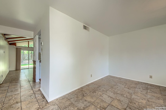 3206 Bluefield, San Antonio, TX 78230 - empty room with stone tile floors and baseboards