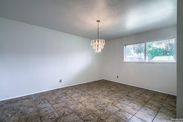3206 Bluefield, San Antonio, TX 78230 - unfurnished room featuring baseboards, a chandelier, and stone finish flooring