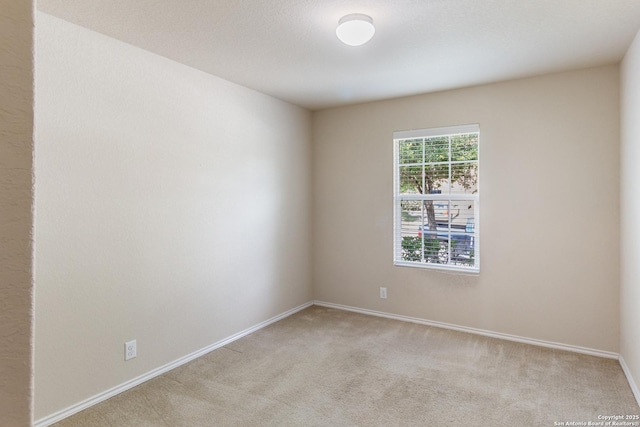4519 Jeffs Farm, San Antonio, TX 78244 - spare room featuring light colored carpet and baseboards