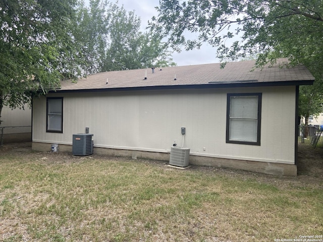 3435 Gateway Dr, San Antonio, TX 78210 - rear view of house with cooling unit