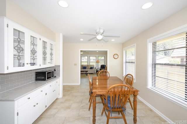 1415 Synandra, San Antonio, TX 78232 - dining space with ceiling fan, recessed lighting, baseboards, and light tile patterned flooring
