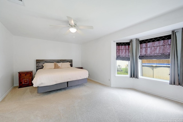 7410 Tom Watson, San Antonio, TX 78244 - carpeted bedroom featuring baseboards and a ceiling fan