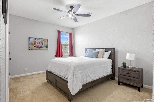 11227 Raw Sienna, Helotes, TX 78023 - bedroom with light carpet, baseboards, and a ceiling fan