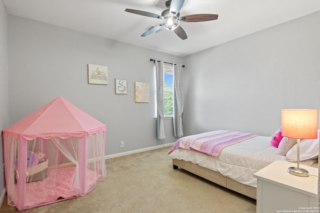 11227 Raw Sienna, Helotes, TX 78023 - carpeted bedroom with baseboards and a ceiling fan