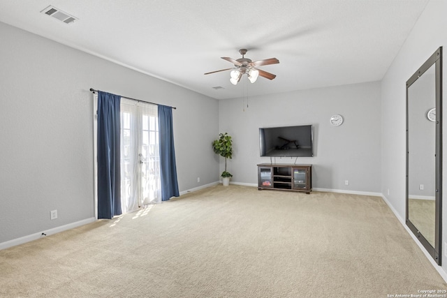 11227 Raw Sienna, Helotes, TX 78023 - unfurnished living room with light colored carpet, a ceiling fan, and baseboards