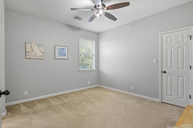 11227 Raw Sienna, Helotes, TX 78023 - carpeted spare room with a ceiling fan and baseboards