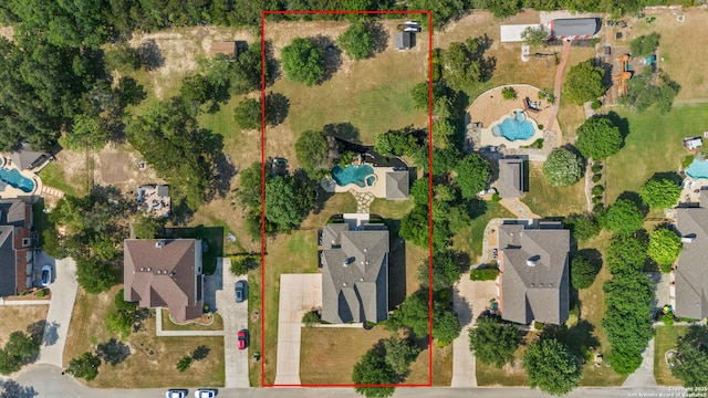 11227 Raw Sienna, Helotes, TX 78023 - aerial perspective of suburban area featuring a pool