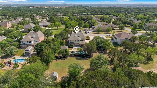 11227 Raw Sienna, Helotes, TX 78023 - aerial perspective of suburban area featuring a pool