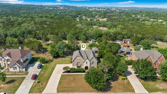 11227 Raw Sienna, Helotes, TX 78023 - aerial overview of property's location with a heavily wooded area